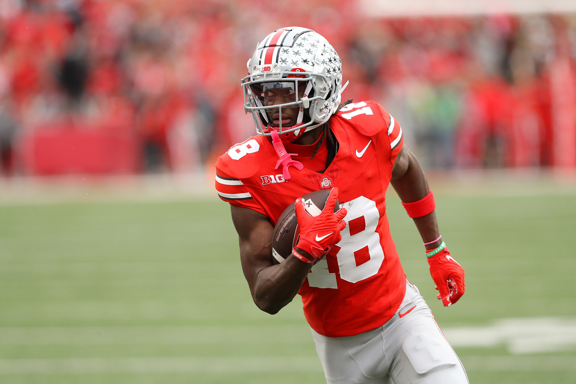Ohio State Buckeyes wide receiver Marvin Harrison Jr. (18) scores a touchdown against the Penn State Nittany Lions during the fourth quarter at Ohio Stadium.