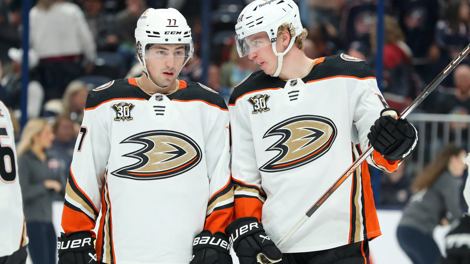 Anaheim Ducks right wing Frank Vatrano (77) and defenseman Jackson LaCombe (60) talk during the second period against the Columbus Blue Jackets at Nationwide Arena.