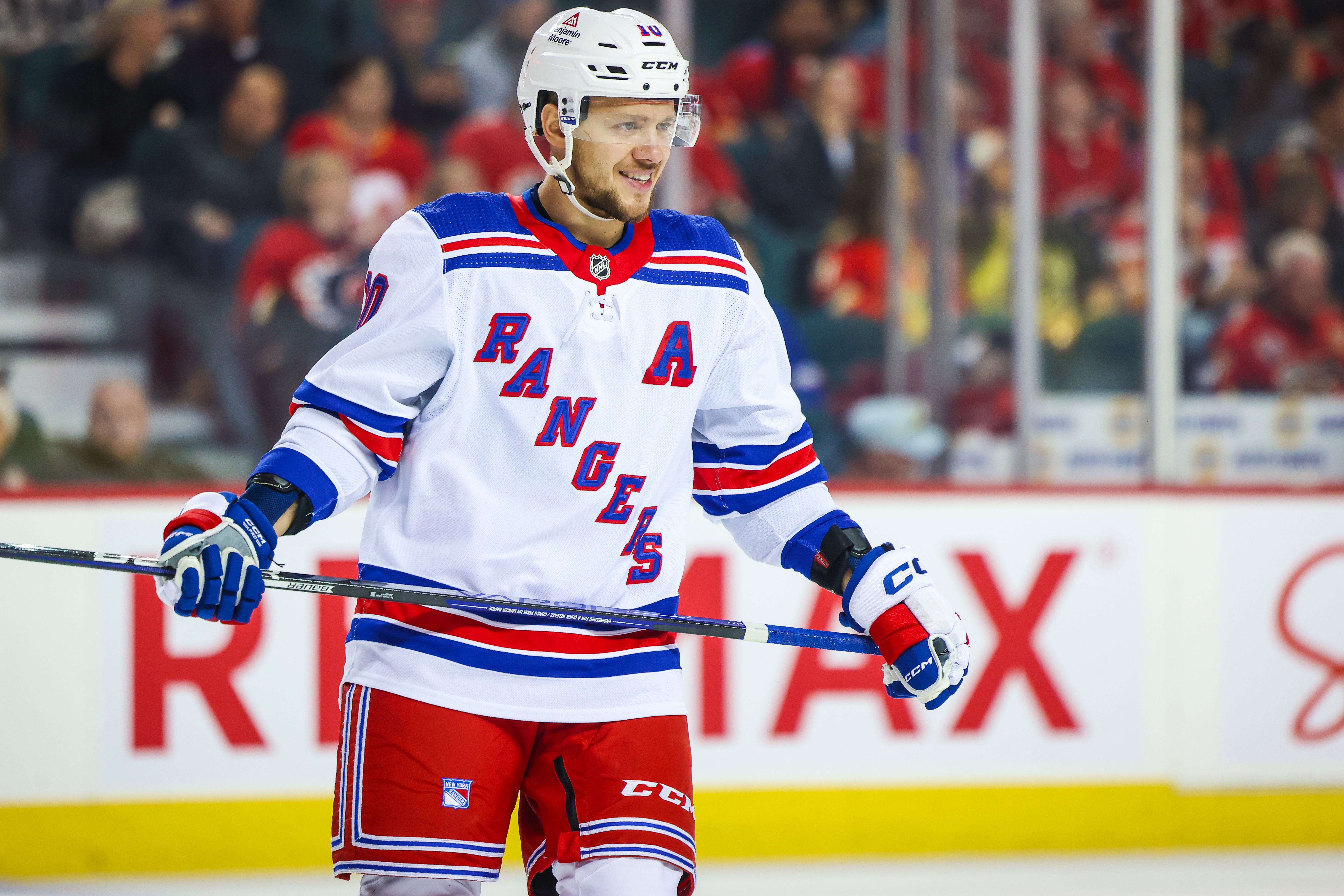 Oct 24, 2023; Calgary, Alberta, CAN; New York Rangers left wing Artemi Panarin (10) reacts during the second period against the Calgary Flames at Scotiabank Saddledome.