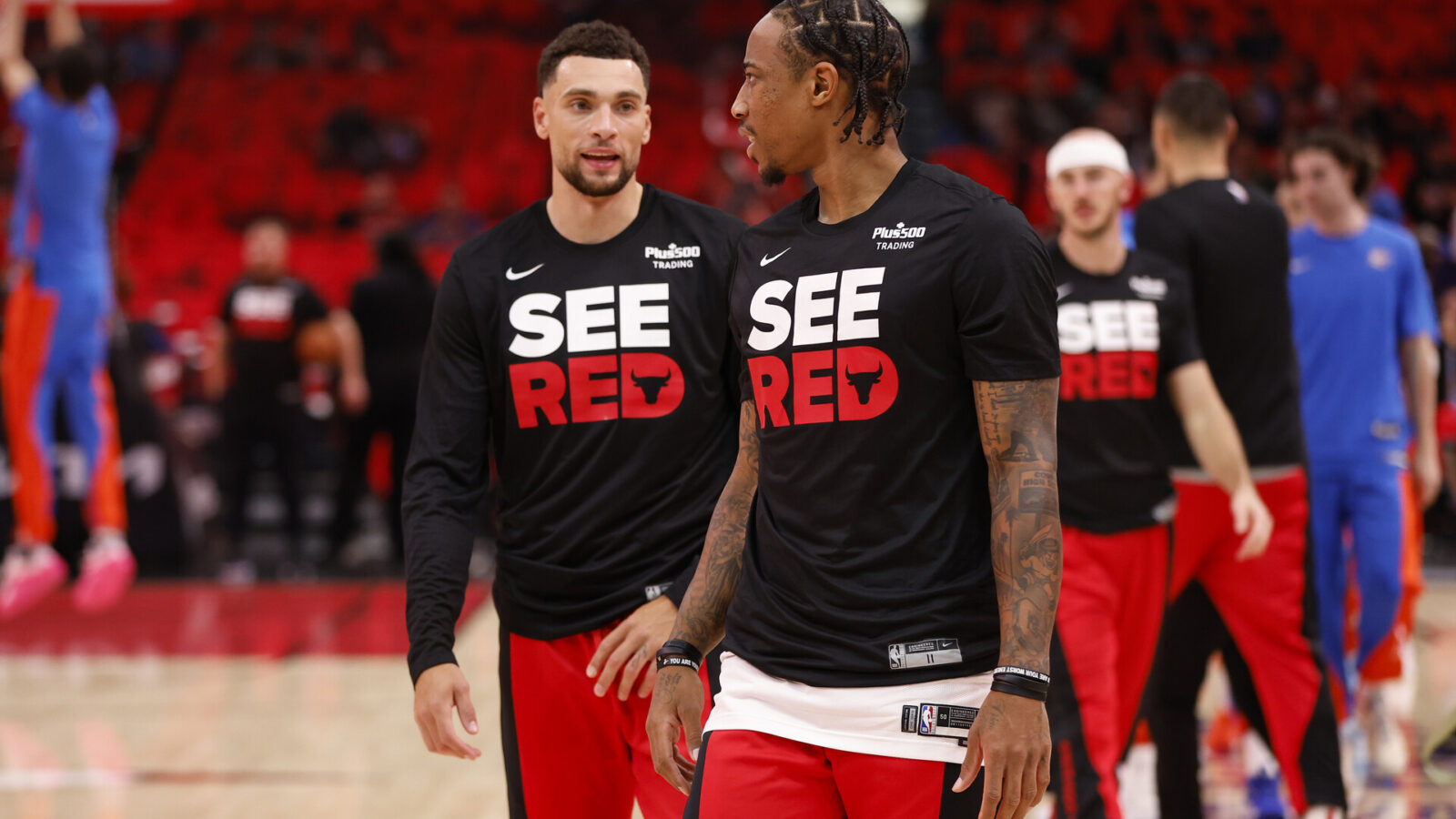 Oct 25, 2023; Chicago, Illinois, USA; Chicago Bulls guard Zach LaVine (8) and forward DeMar DeRozan (11) warms up before a basketball game against the Oklahoma City Thunder at United Center.