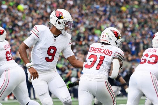 Oct 22, 2023; Seattle, Washington, USA; Arizona Cardinals quarterback Joshua Dobbs (9) hands the ball to Arizona Cardinals running back Emari Demercado (31) during the game at Lumen Field.