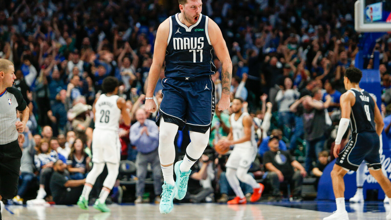 Oct 27, 2023; Dallas, Texas, USA; Dallas Mavericks guard Luka Doncic (77) reacts after hitting a go ahead 3-pointer late in the fourth quarter against the Brooklyn Nets at American Airlines Cente