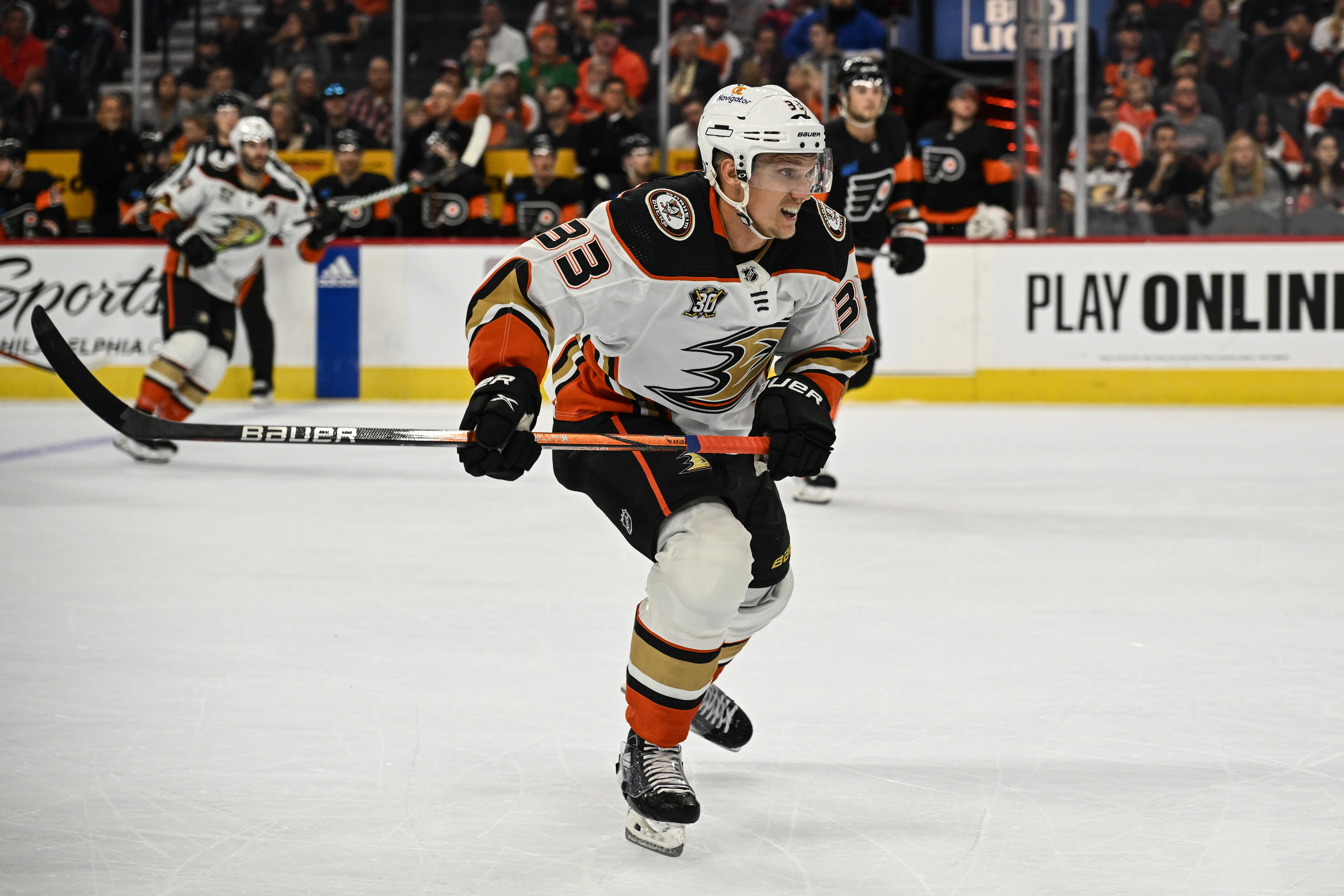 Oct 28, 2023; Philadelphia, Pennsylvania, USA; Anaheim Ducks right wing Jakob Silfverberg (33) chases a puck into the corner during the first period against the Philadelphia Flyers at Wells Fargo Center.