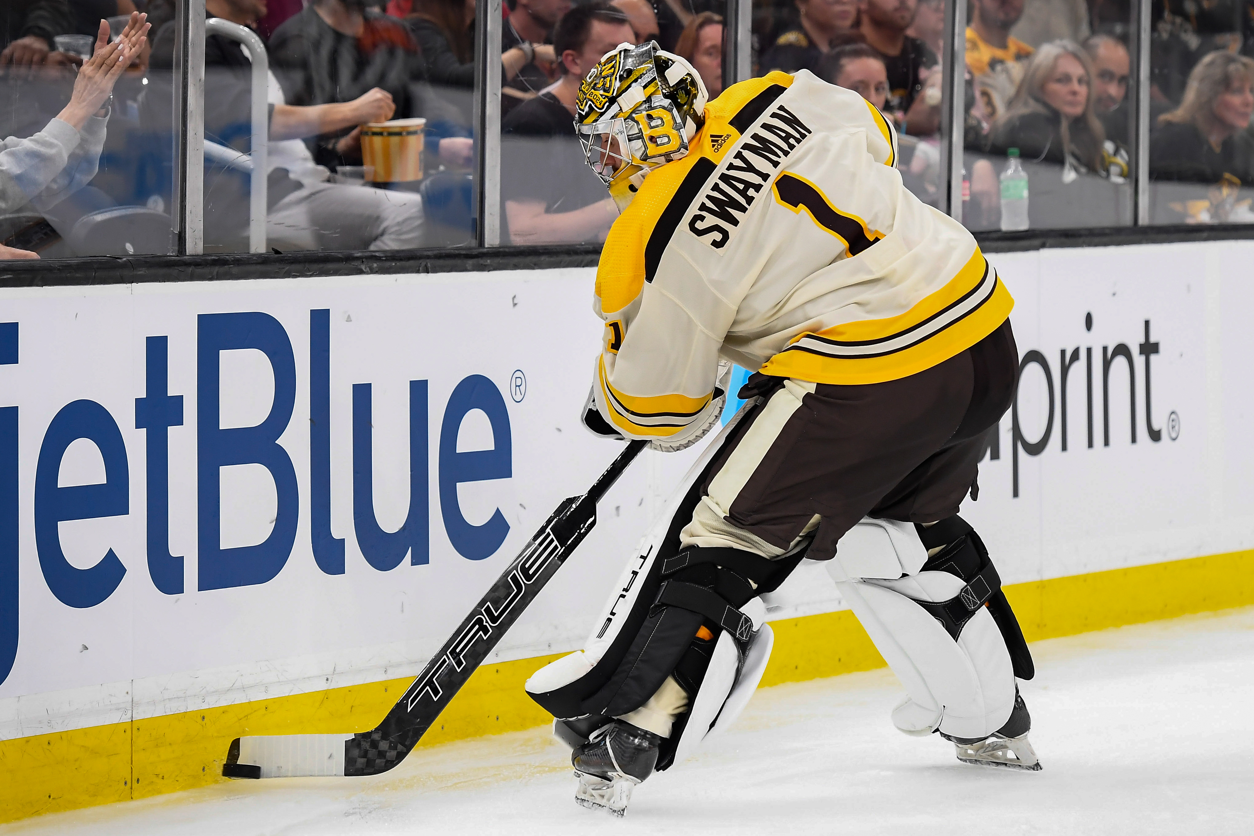 Oct 26, 2023; Boston, Massachusetts, USA; Boston Bruins goaltender Jeremy Swayman (1) controls the puck during the second period against the Detroit Red Wings at TD Garden.