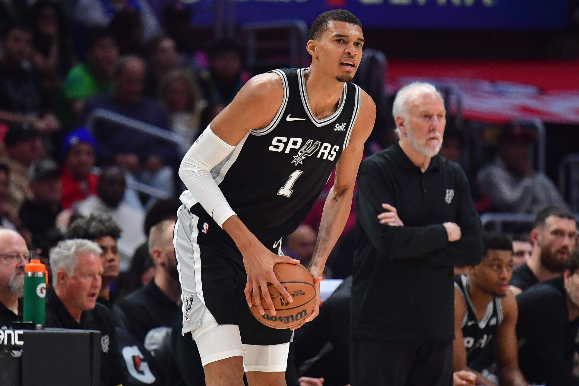 Oct 29, 2023; Los Angeles, California, USA; San Antonio Spurs center Victor Wembanyama (1) controls the ball against the Los Angeles Clippers during the first half at Crypto.com Arena.