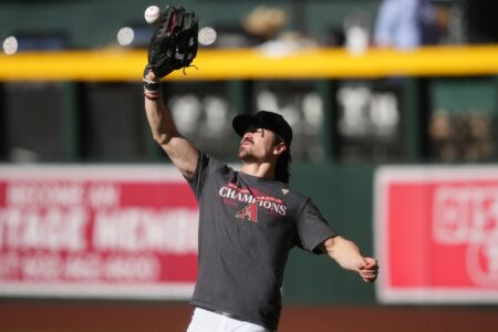 Arizona Diamondbacks outfielder Corbin Carroll practices before Game 3 of the World Series against the Texas Rangers at Chase Field on Oct. 30, 2023, in Phoenix, Arizona.