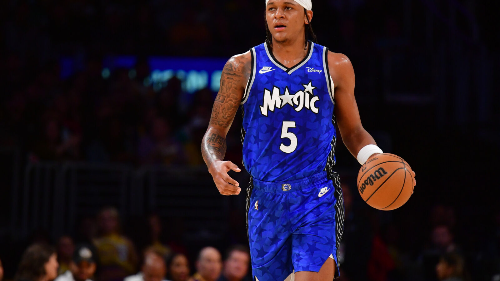 Oct 30, 2023; Los Angeles, California, USA; Orlando Magic forward Paolo Banchero (5) moves the ball up court against the Los Angeles Lakers during the first half at Crypto.com