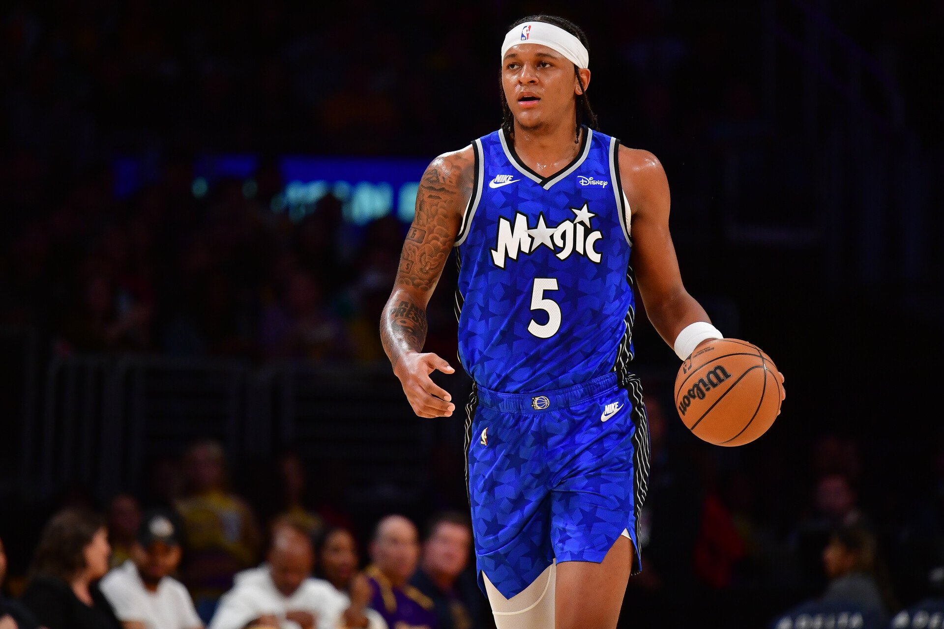 Oct 30, 2023; Los Angeles, California, USA; Orlando Magic forward Paolo Banchero (5) moves the ball up court against the Los Angeles Lakers during the first half at Crypto.com