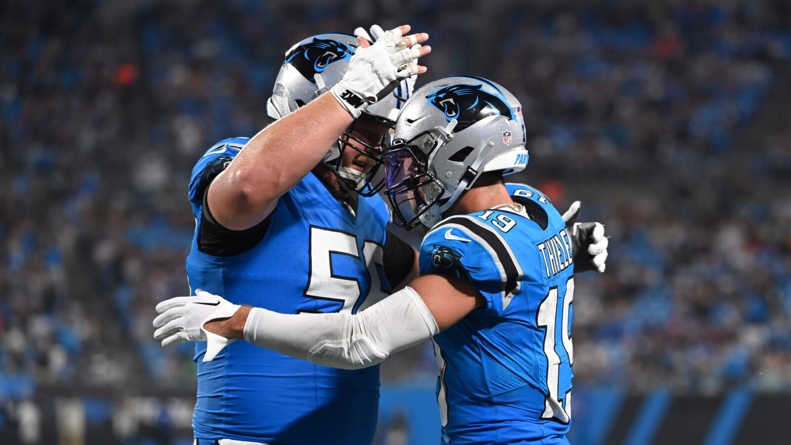 Aug 25, 2023; Charlotte, North Carolina, USA; Carolina Panthers wide receiver Adam Thielen (19) celebrates with center Bradley Bozeman (56) after scoring a touchdown in the first quarter at Bank of America Stadium.