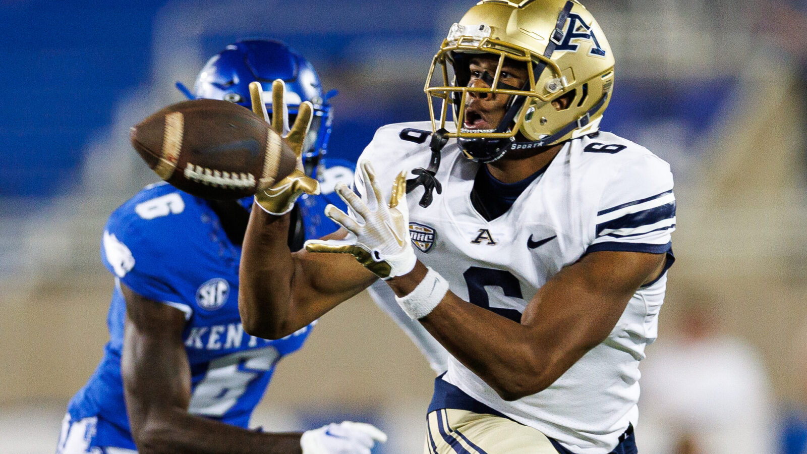 Akron Zips wide receiver Caleb Anderson (6) catches a pass during the fourth quarter against the Kentucky Wildcats at Kroger Field.
