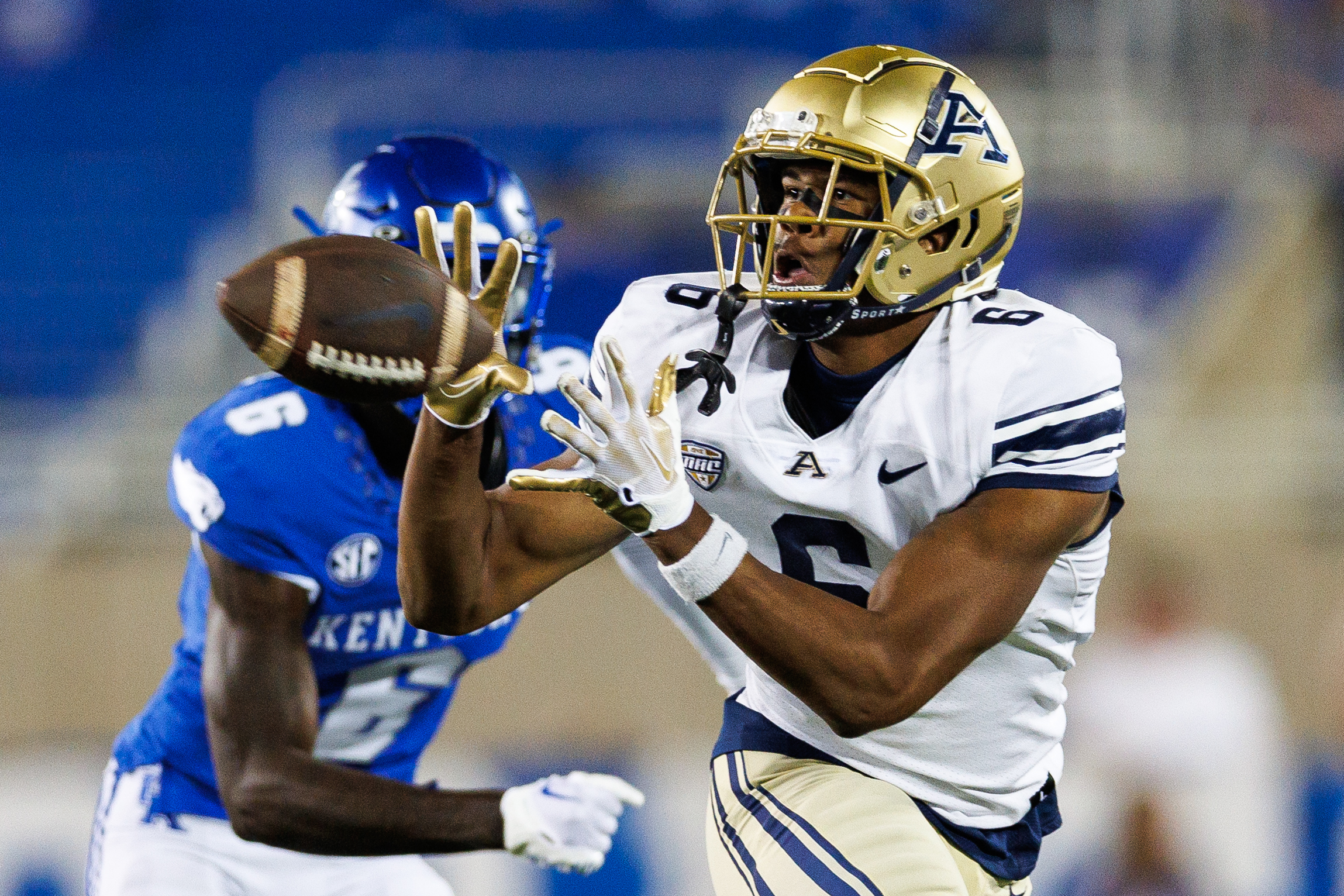 Akron Zips wide receiver Caleb Anderson (6) catches a pass during the fourth quarter against the Kentucky Wildcats at Kroger Field.
