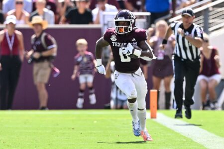 Sep 23, 2023; College Station, Texas, USA; Texas A&M Aggies wide receiver Ainias Smith (0) runs a punt during the first quarter against the Auburn Tigers at Kyle Field.