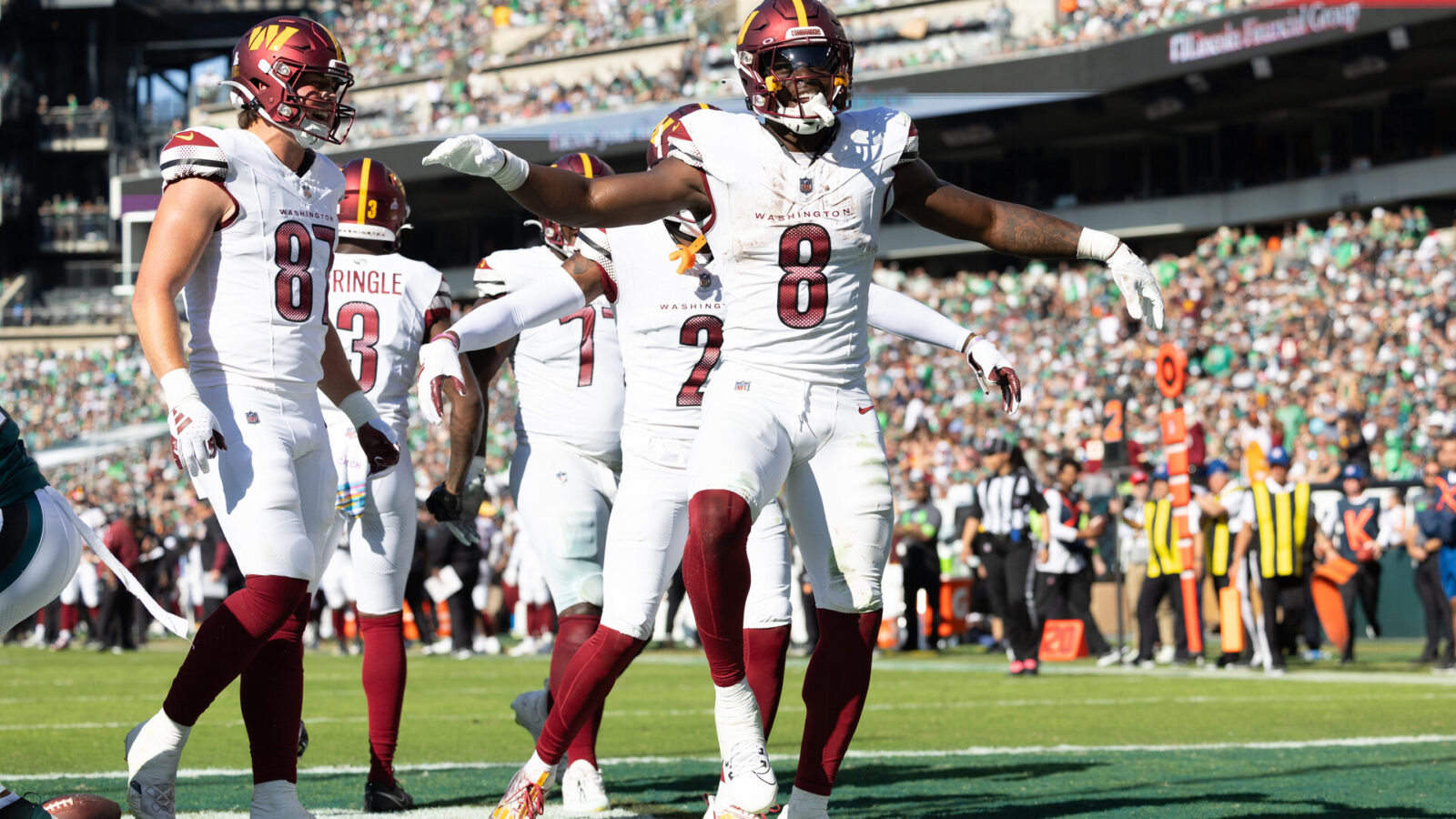 Oct 1, 2023; Philadelphia, Pennsylvania, USA; Washington Commanders running back Brian Robinson Jr. (8) celebrates his touchdown against the Philadelphia Eagles during the fourth quarter at Lincoln Financial Field