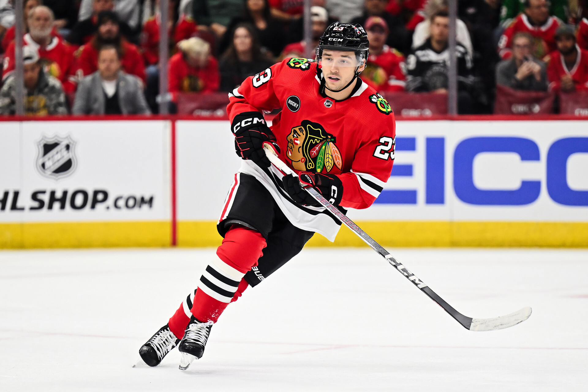 Sep 28, 2023; Chicago, Illinois, USA; Chicago Blackhawks forward Philipp Kurashev (23) skates against the St. Louis Blues at United Center.
