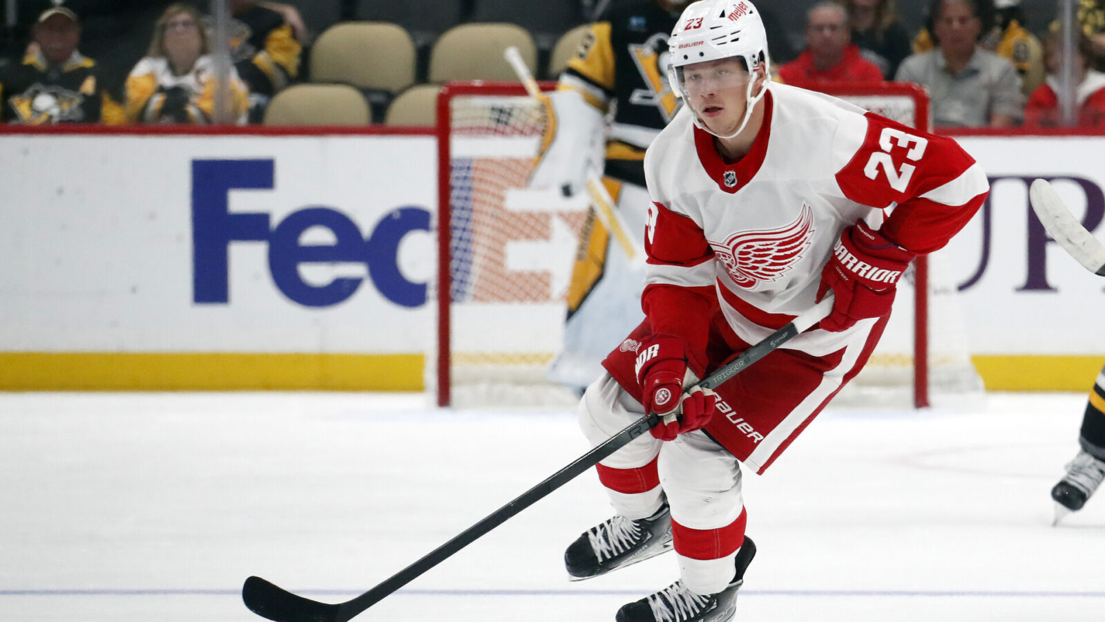 Oct 4, 2023; Pittsburgh, Pennsylvania, USA; Detroit Red Wings left wing Lucas Raymond (23) handles the puck against the Pittsburgh Penguins during the first period at PPG Paints Arena.