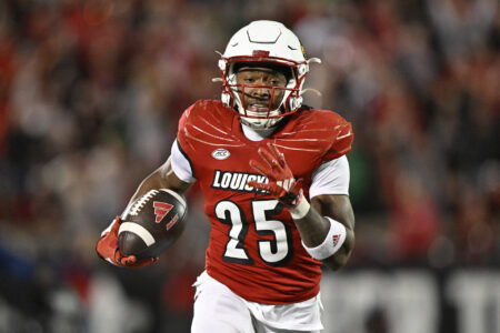 Louisville Cardinals running back Jawhar Jordan (25) runs the ball to score a touchdown against the Notre Dame Fighting Irish during the second half at L&N Federal Credit Union Stadium. Louisville defeated Notre Dame 33-20.