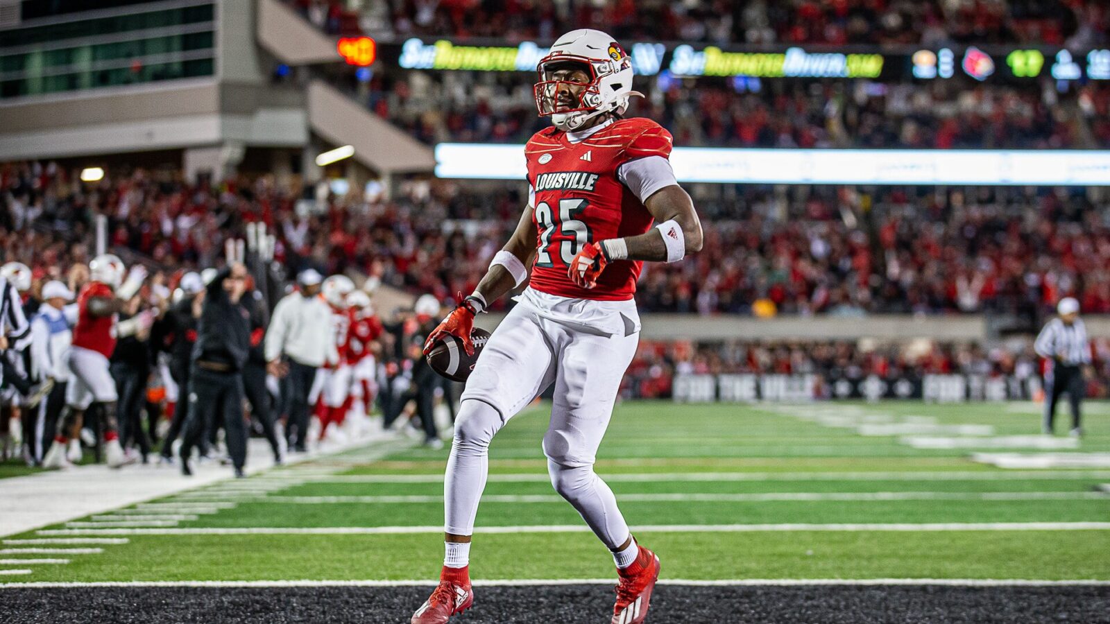 Louisville running back Jawhar Jordan (25) celebrated after scoring on a 21 yard run in the fourth quarter as the Louisville Cardinals defeated the Notre Dame Fighting Irish, 33-20 on Saturday, Oct. 7, 2023.