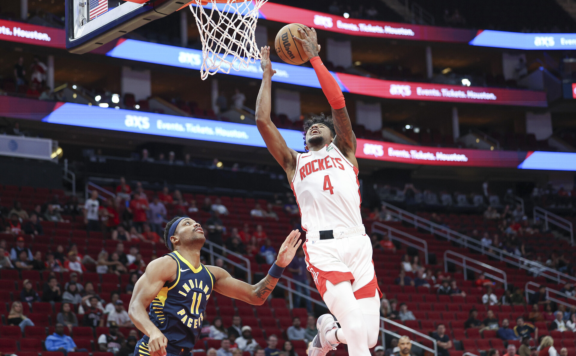 Oct 10, 2023; Houston, Texas, USA; Houston Rockets guard Jalen Green (4) shoots the ball as Indiana Pacers forward Bruce Brown (11) defends during the first quarter at Toyota Center