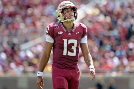 Oct 14, 2023; Tallahassee, Florida, USA; Florida State Seminoles quarterback Jordan Travis (13) against the Syracuse Orange during the first half at Doak S. Campbell Stadium.