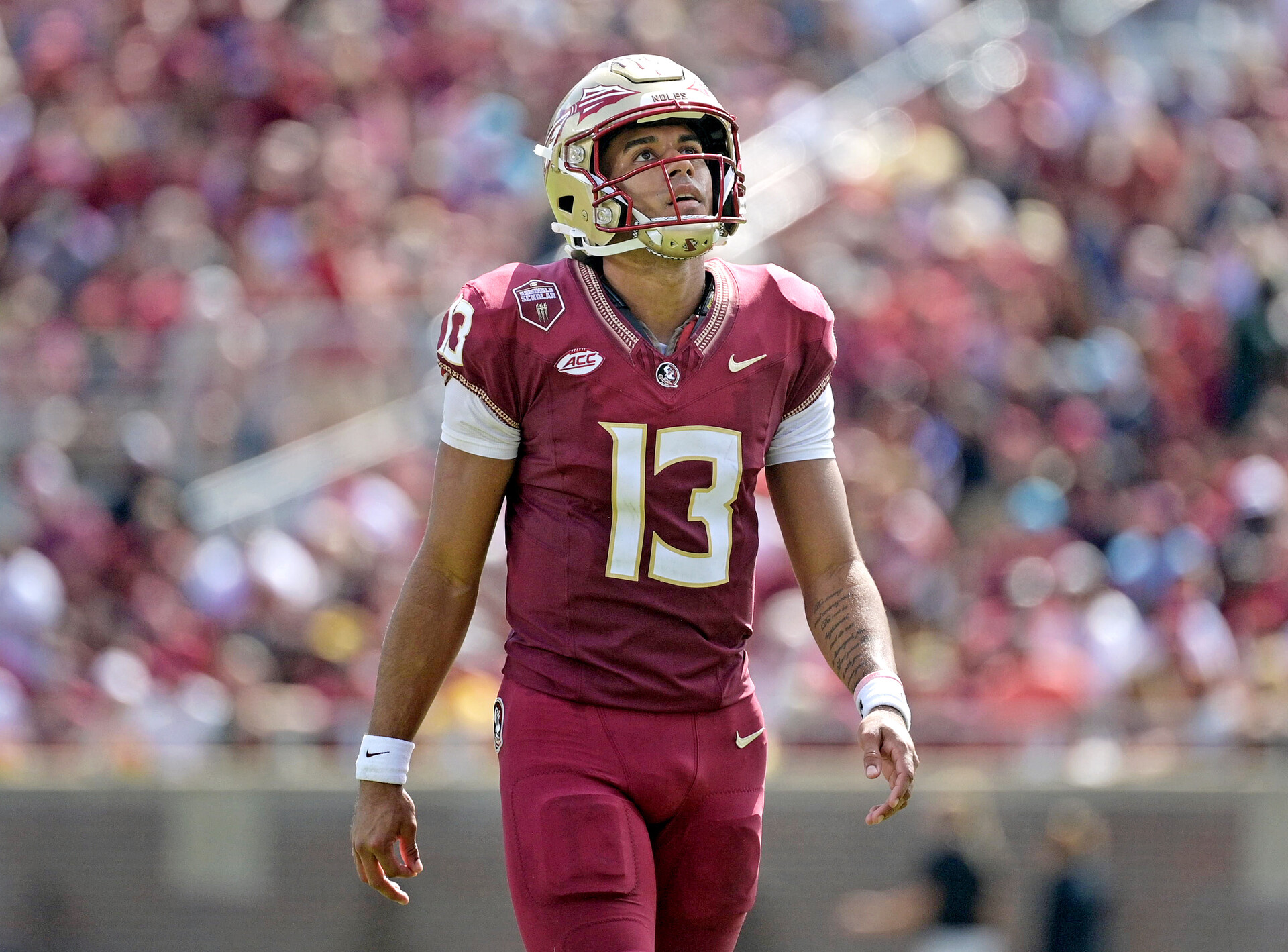 Oct 14, 2023; Tallahassee, Florida, USA; Florida State Seminoles quarterback Jordan Travis (13) against the Syracuse Orange during the first half at Doak S. Campbell Stadium.