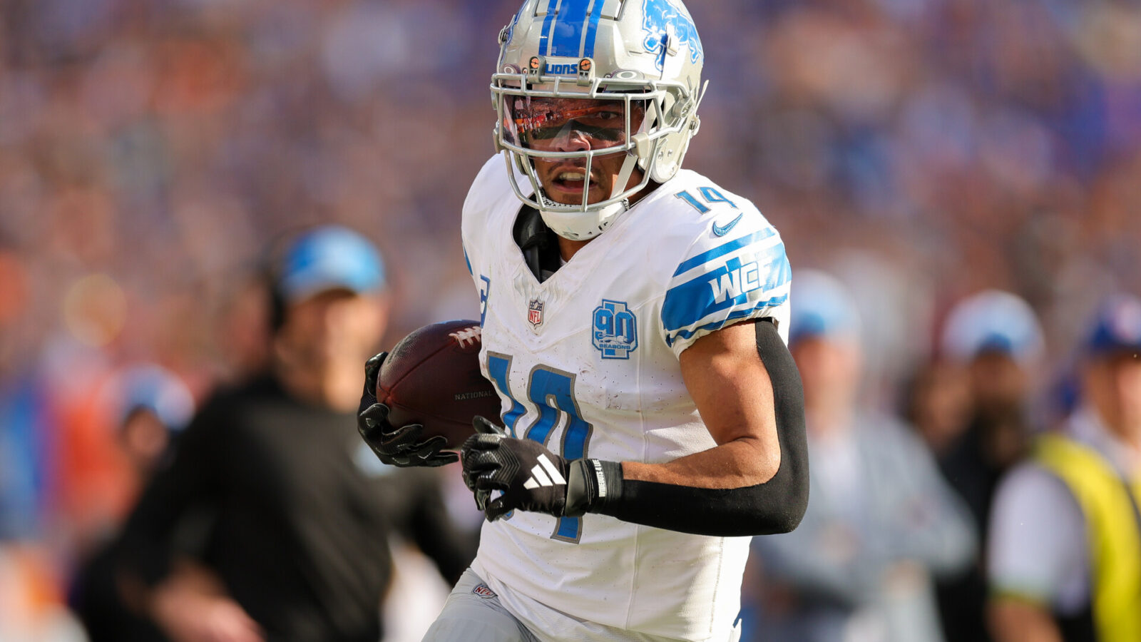 Oct 15, 2023; Tampa, Florida, USA; Detroit Lions wide receiver Amon-Ra St. Brown (14) runs for a touchdown against the Tampa Bay Buccaneers in the second quarter at Raymond James Stadium.