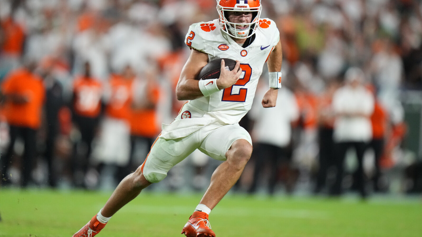 Oct 21, 2023; Miami Gardens, Florida, USA; Clemson Tigers quarterback Cade Klubnik (2) runs the ball against the Miami Hurricanes during the fourth quarter at Hard Rock Stadium.