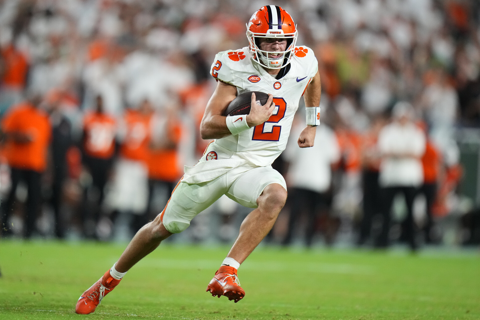 Oct 21, 2023; Miami Gardens, Florida, USA; Clemson Tigers quarterback Cade Klubnik (2) runs the ball against the Miami Hurricanes during the fourth quarter at Hard Rock Stadium.