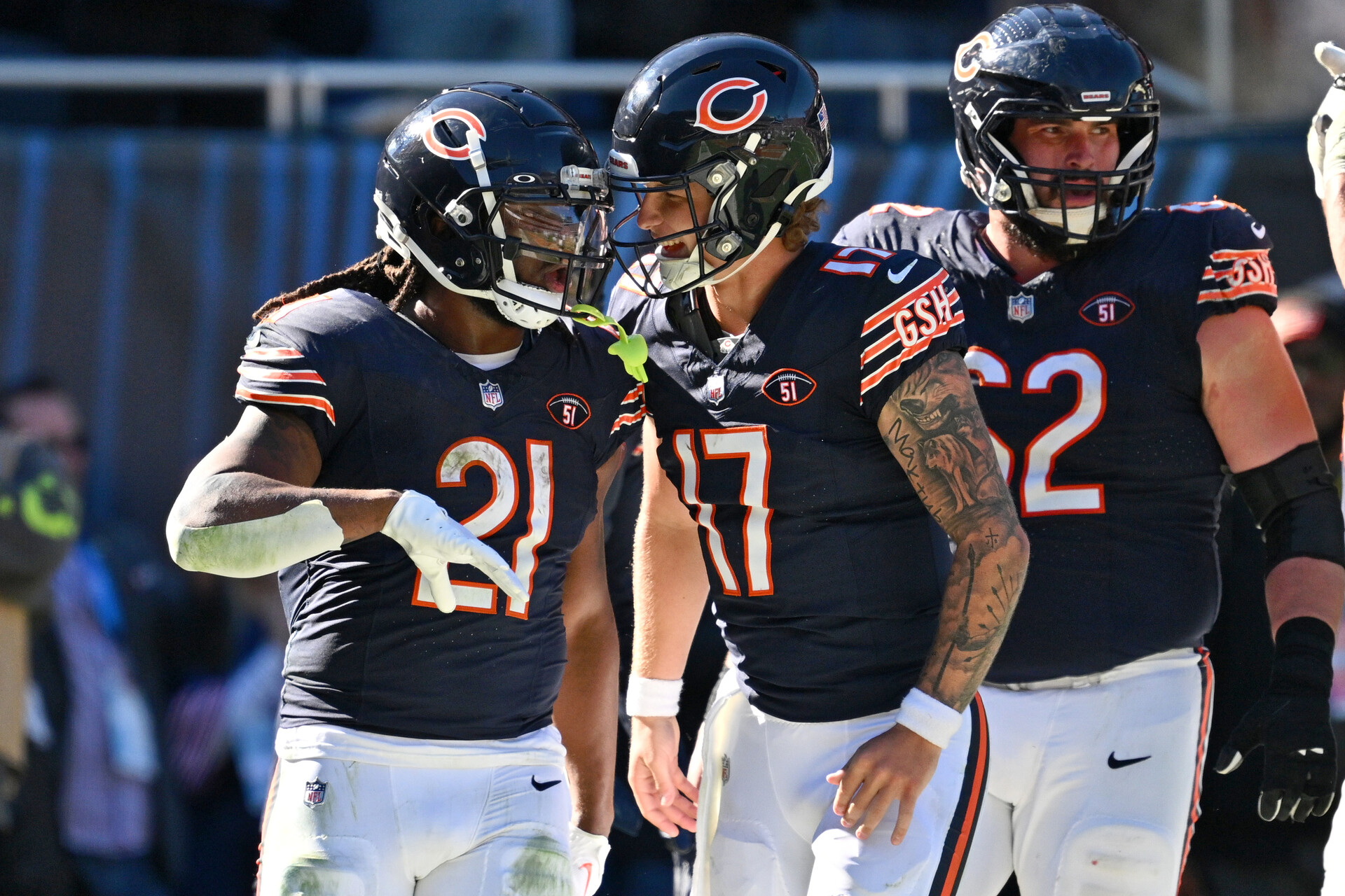 Chicago Bears running back D'Onta Foreman (21) celebrates with quarterback Tyson Bagent (17) after scoring a touch down in the third quarter against the Las Vegas Raiders at Soldier Field.