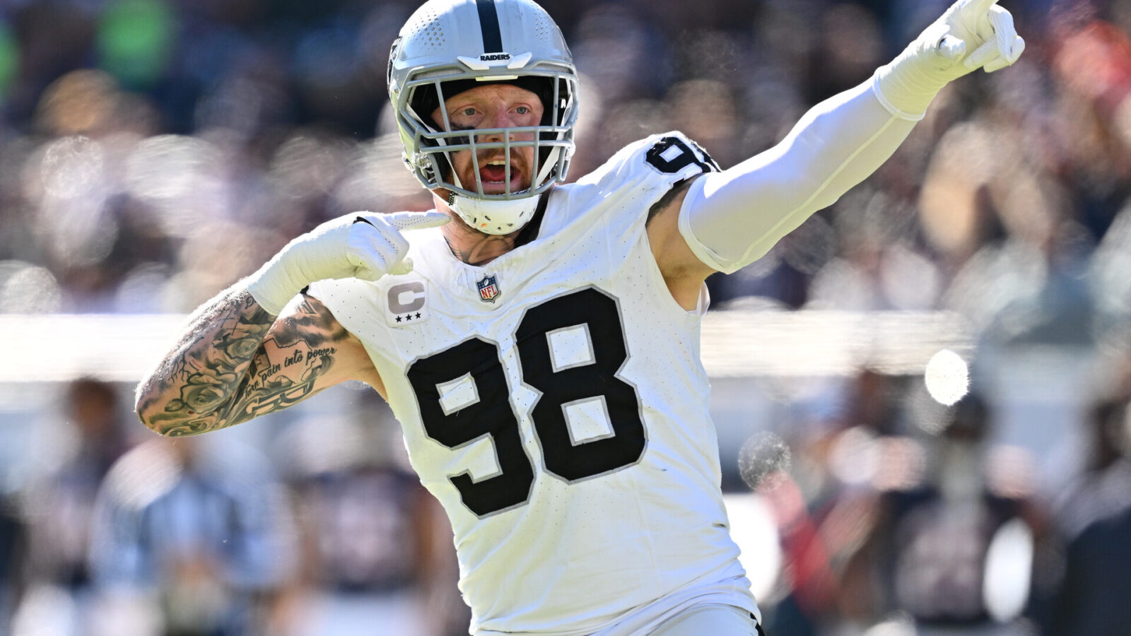 Las Vegas Raiders defensive end Maxx Crosby (98) reacts after the Chicago Bears jumped the snap in the third quarter at Soldier Field.