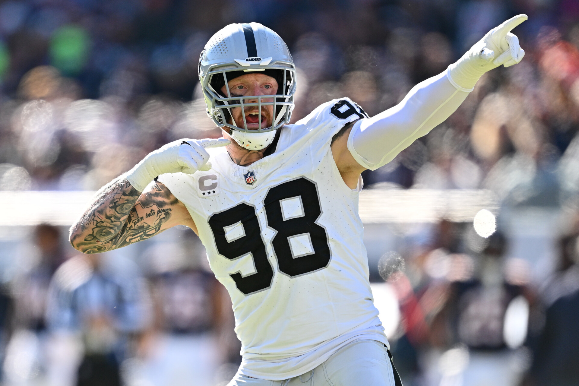 Las Vegas Raiders defensive end Maxx Crosby (98) reacts after the Chicago Bears jumped the snap in the third quarter at Soldier Field.