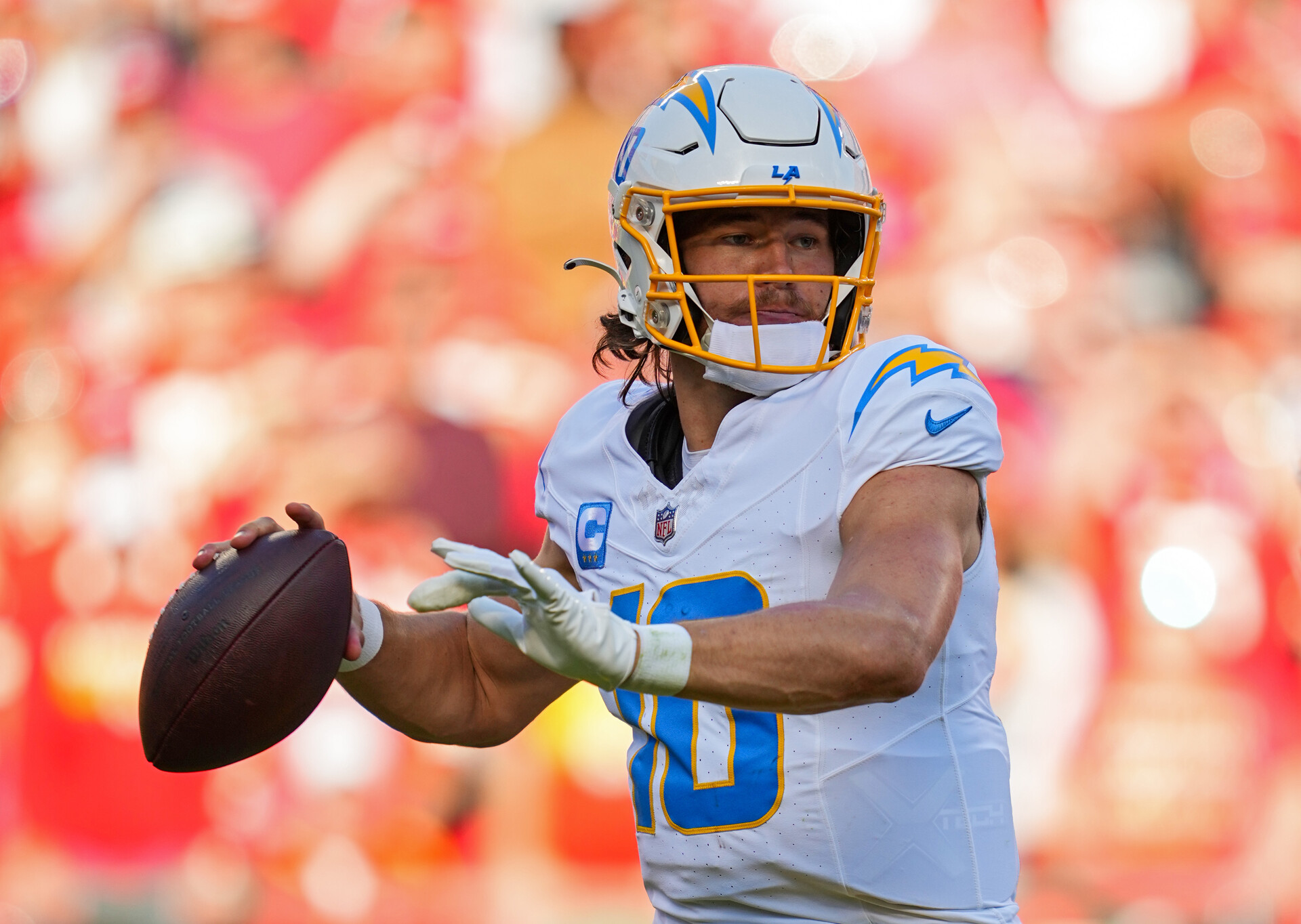 Oct 22, 2023; Kansas City, Missouri, USA; Los Angeles Chargers quarterback Justin Herbert (10) throws a pass during the second half against the Kansas City Chiefs at GEHA Field at Arrowhead Stadium.