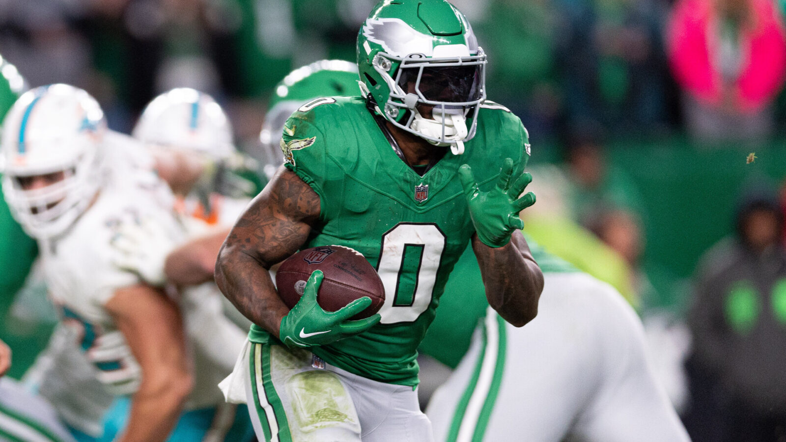 Oct 22, 2023; Philadelphia, Pennsylvania, USA; Philadelphia Eagles running back D'Andre Swift (0) runs with the ball against the Miami Dolphins during the fourth quarter at Lincoln Financial Field.