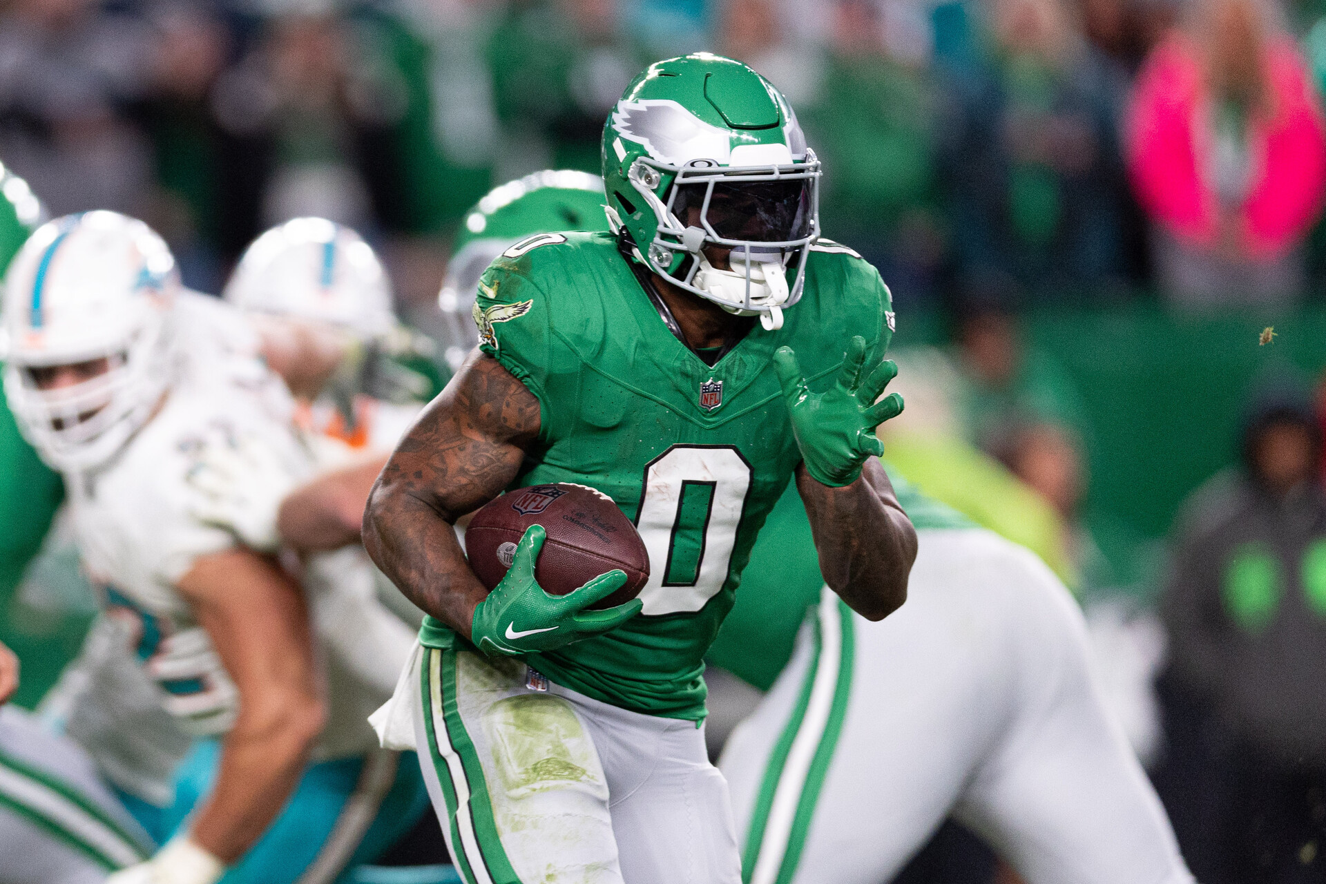 Oct 22, 2023; Philadelphia, Pennsylvania, USA; Philadelphia Eagles running back D'Andre Swift (0) runs with the ball against the Miami Dolphins during the fourth quarter at Lincoln Financial Field.