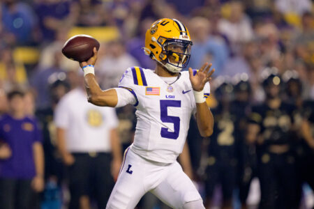 Oct 21, 2023; Baton Rouge, Louisiana, USA; LSU Tigers quarterback Jayden Daniels (5) throws against the Army Black Knights during the first quarter at Tiger Stadium.