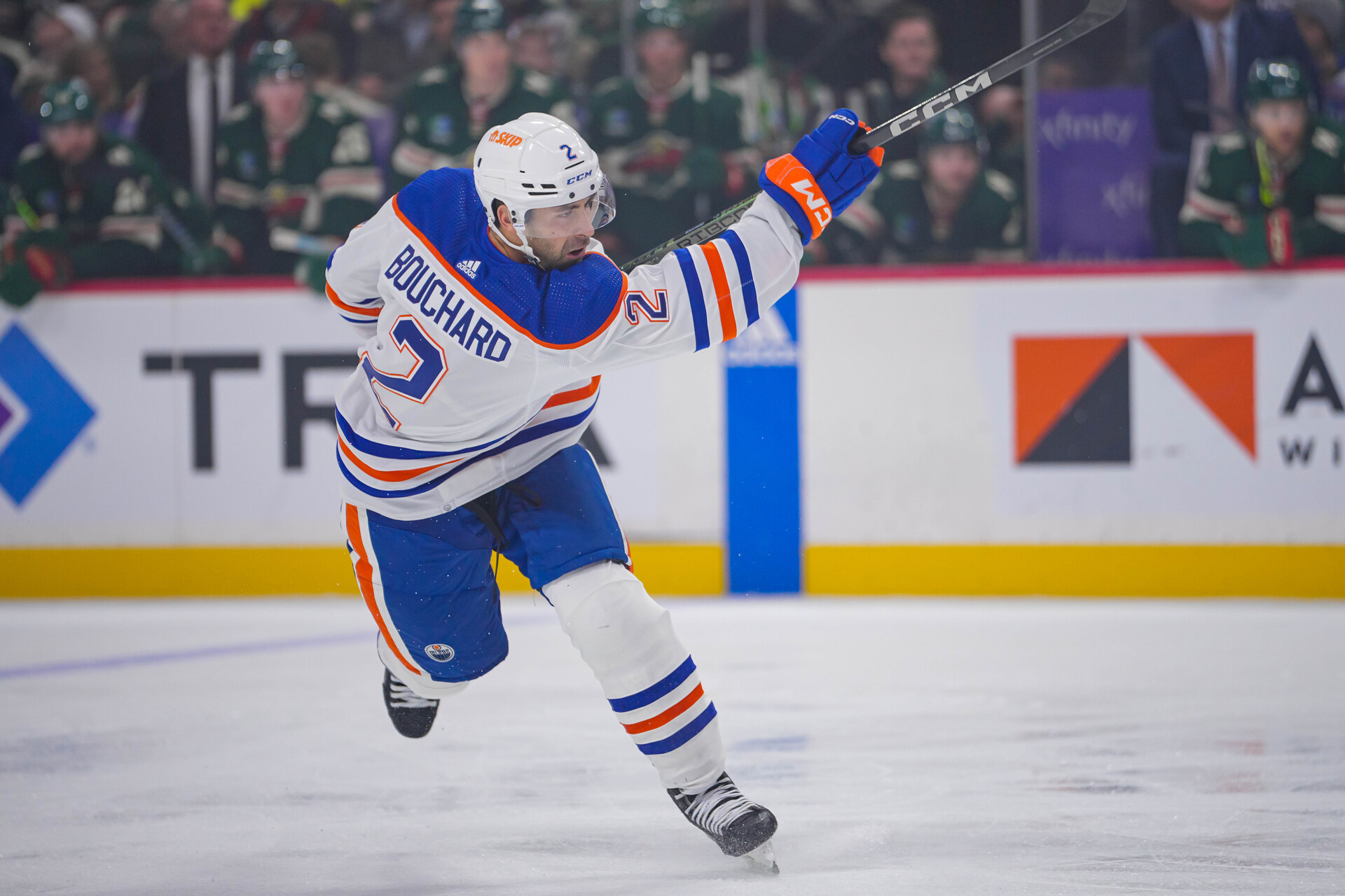 Oct 24, 2023; Saint Paul, Minnesota, USA; Edmonton Oilers defenseman Evan Bouchard (2) shoots against the Minnesota Wild in the first period at Xcel Energy Center.
