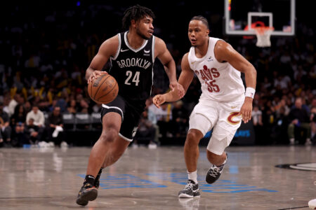 Oct 25, 2023; Brooklyn, New York, USA; Brooklyn Nets guard Cam Thomas (24) controls the ball against Cleveland Cavaliers forward Isaac Okoro (35) during the third quarter at Barclays Center.
