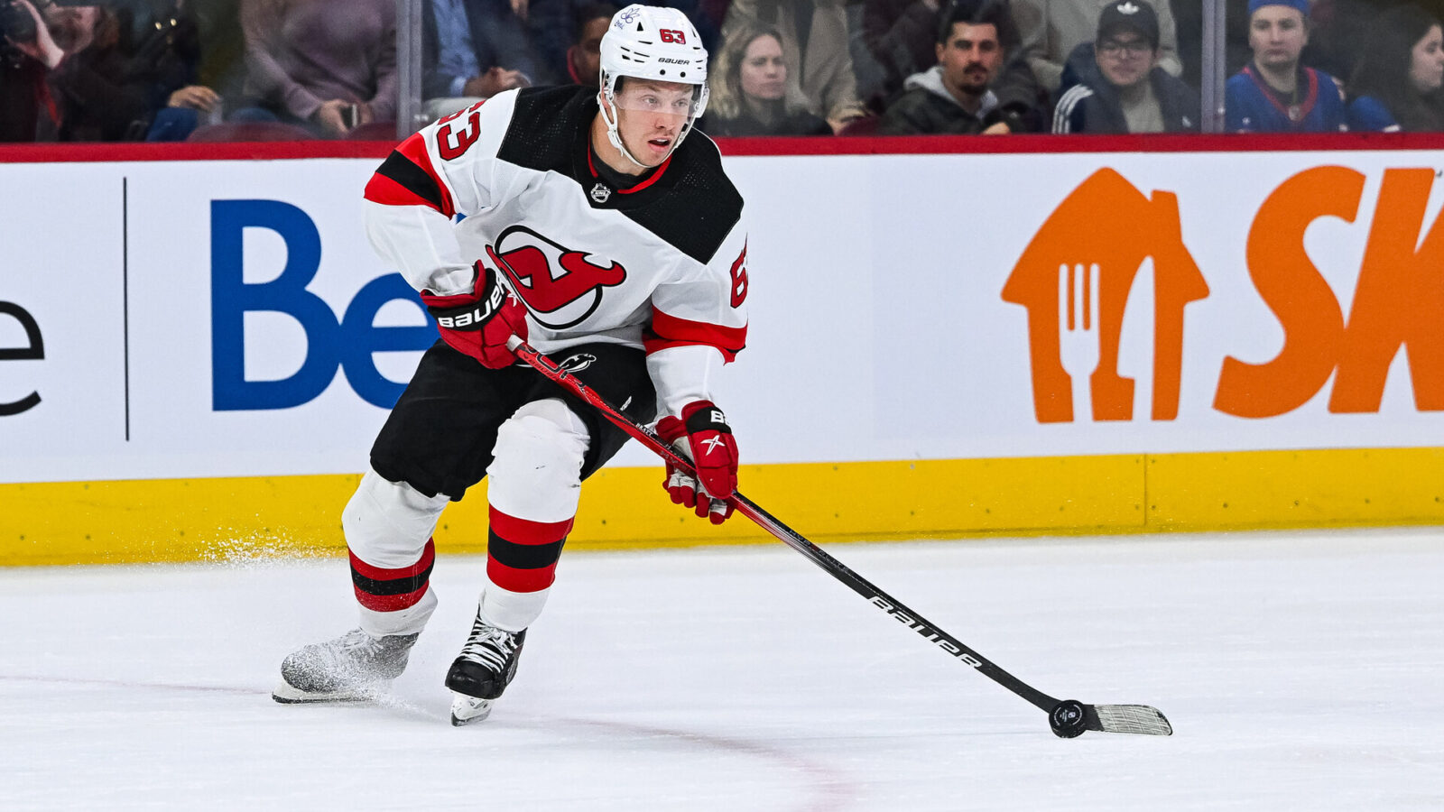 Oct 24, 2023; Montreal, Quebec, CAN; New Jersey Devils left wing Jesper Bratt (63) plays the puck against the Montreal Canadiens during the first period at Bell Centre.