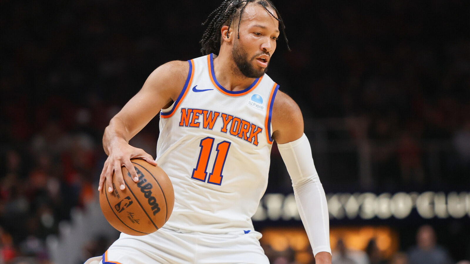 New York Knicks guard Jalen Brunson (11) dribbles against the Atlanta Hawks in the first quarter at State Farm Arena.