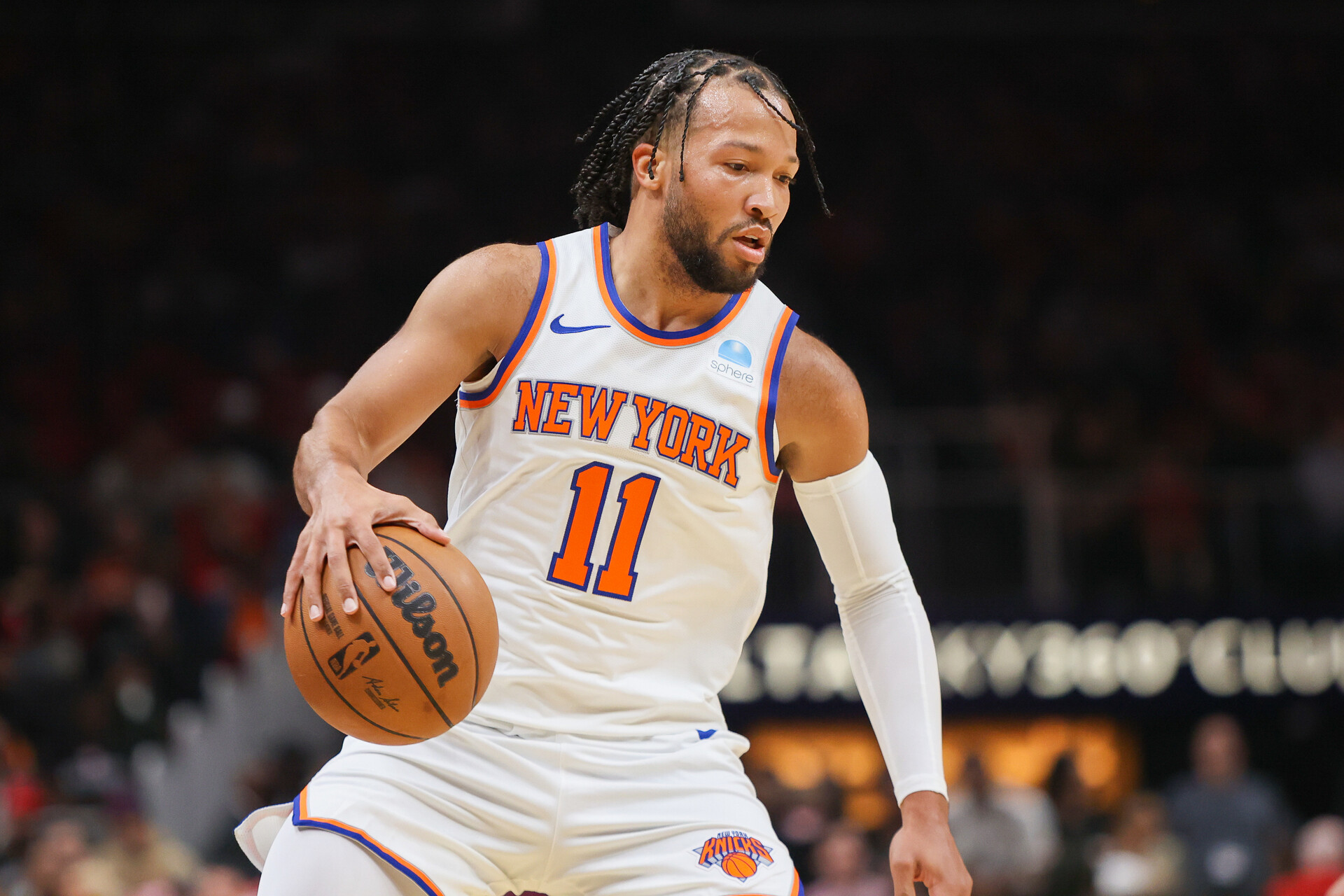 New York Knicks guard Jalen Brunson (11) dribbles against the Atlanta Hawks in the first quarter at State Farm Arena.