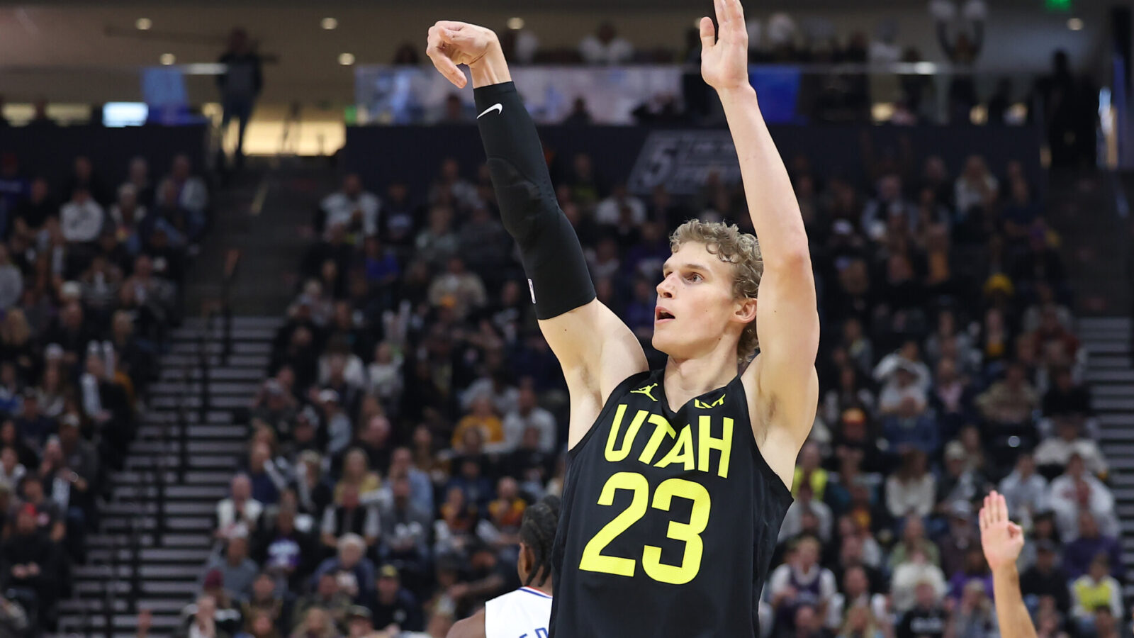 Oct 27, 2023; Salt Lake City, Utah, USA; Utah Jazz forward Lauri Markkanen (23) holds his follow through after making a three point shot against the Los Angeles Clippers in the first quarter at Delta Center.