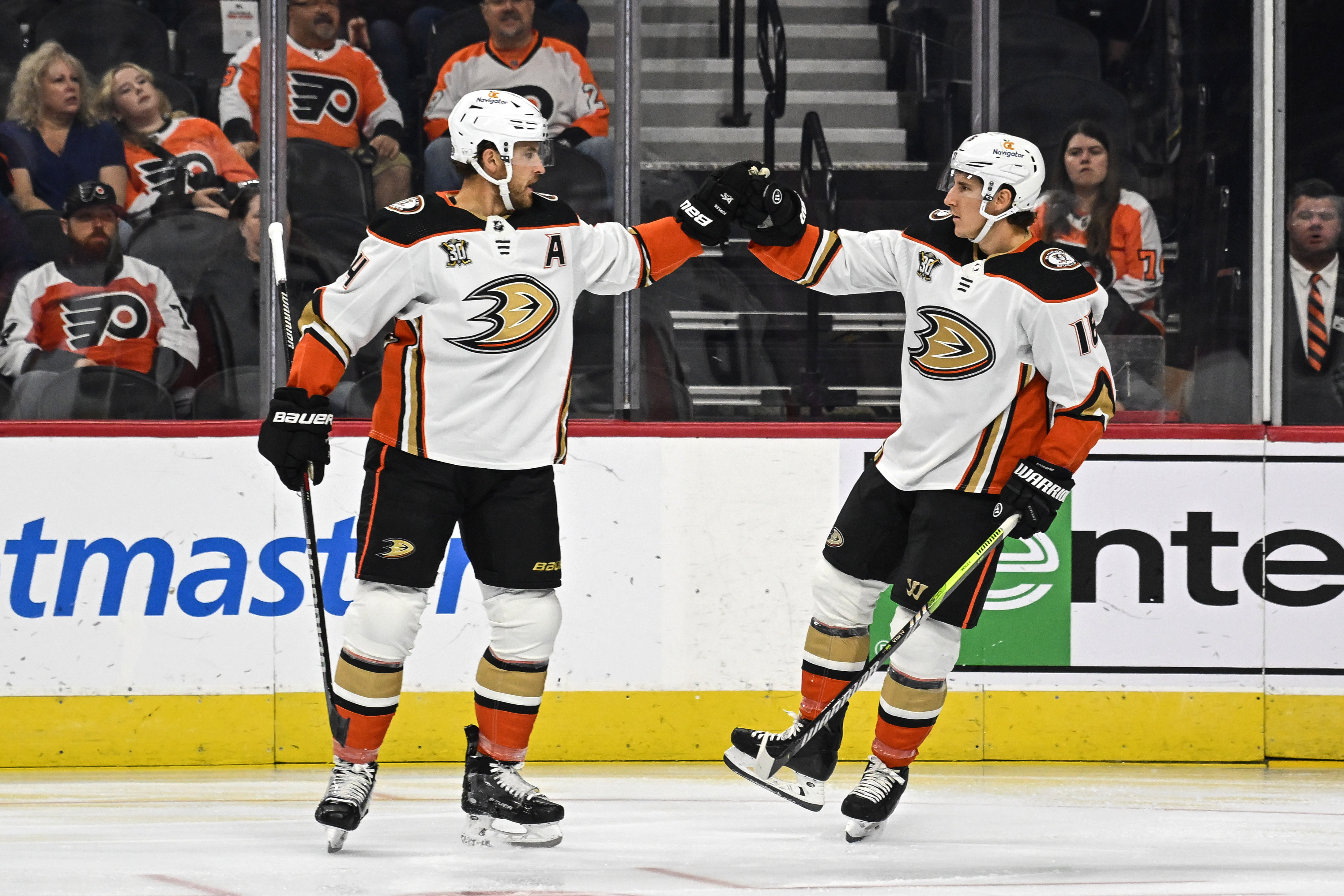 Oct 28, 2023; Philadelphia, Pennsylvania, USA; Anaheim Ducks center Ryan Strome (16) celebrates his goal with defenseman Cam Fowler (4) during the first period against the Philadelphia Flyers at Wells Fargo Center.