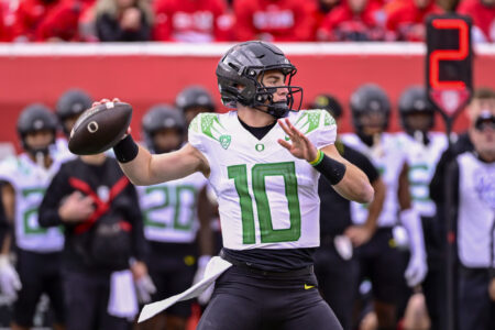 Oct 28, 2023; Salt Lake City, Utah, USA; Oregon Ducks quarterback Bo Nix (10) throws the ball downfield against the Utah Utes during the first half at Rice-Eccles Stadium.