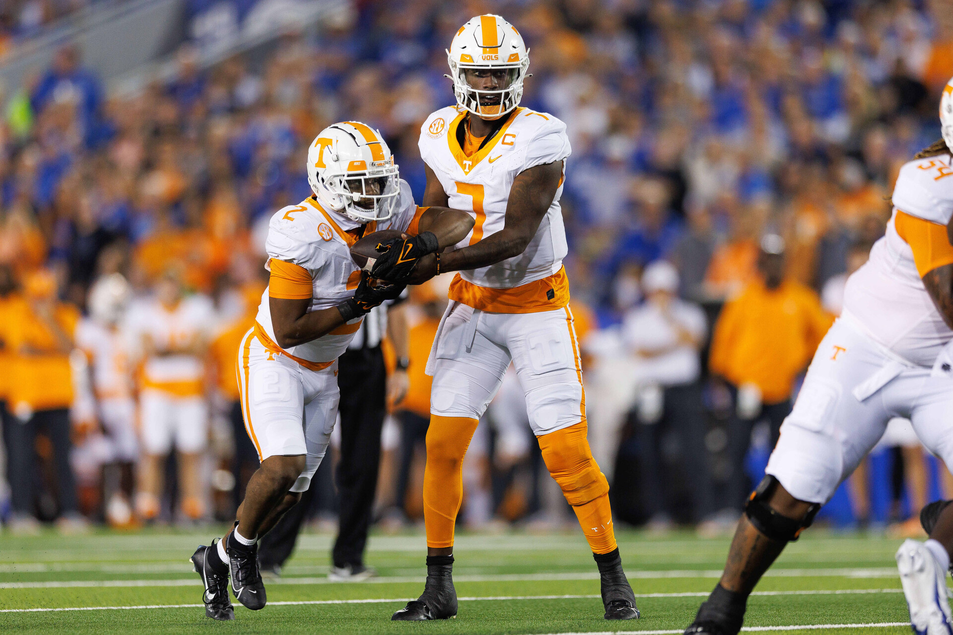 Oct 28, 2023; Lexington, Kentucky, USA; Tennessee Volunteers quarterback Joe Milton III (7) hands the ball off to Tennessee Volunteers running back Jabari Small (2) during the first quarter against the Kentucky Wildcats at Kroger Field.