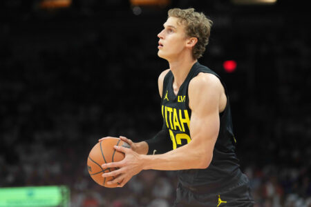 Oct 28, 2023; Phoenix, Arizona, USA; Utah Jazz forward Lauri Markkanen (23) shoots against the Phoenix Suns during the first half at Footprint Center.