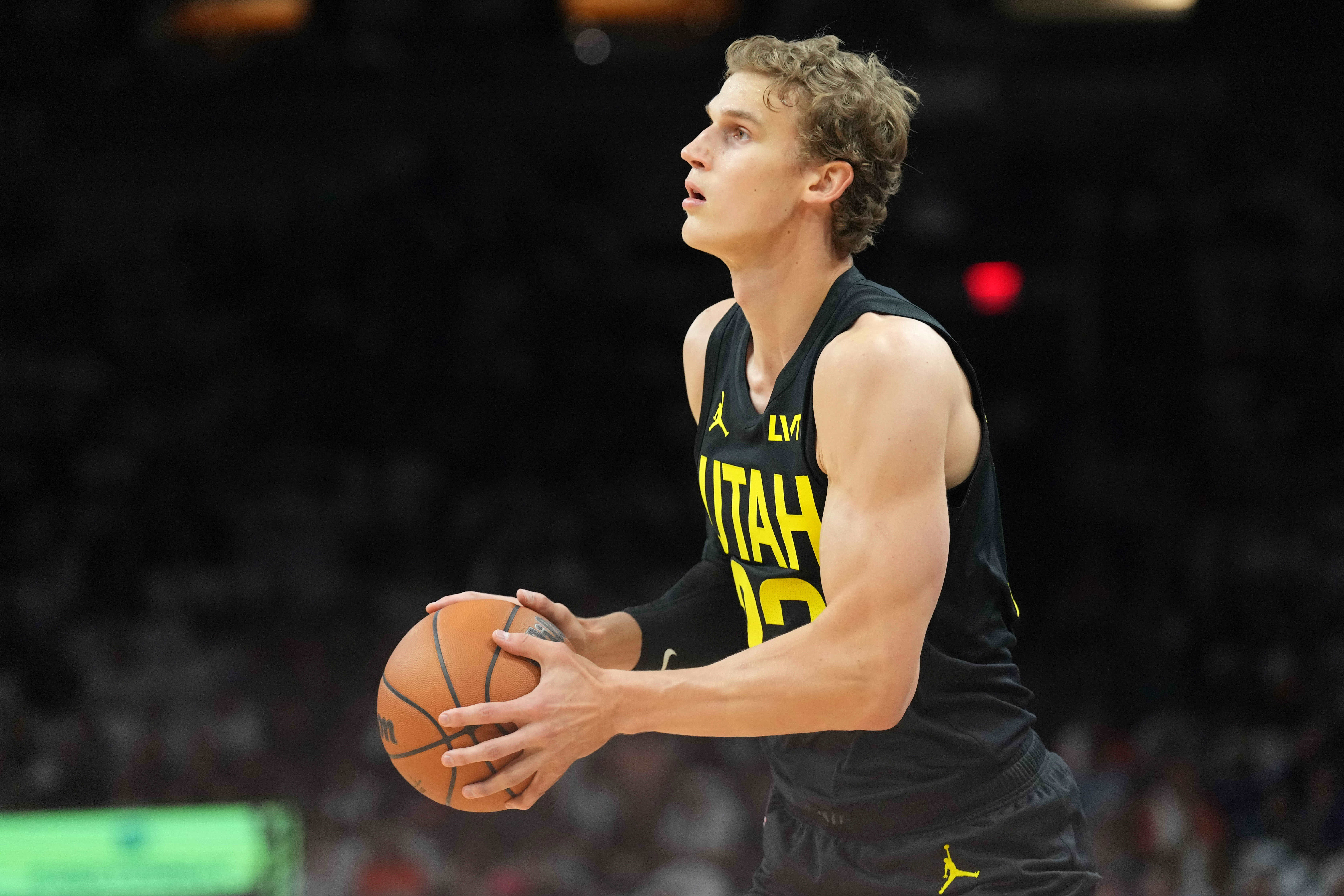 Oct 28, 2023; Phoenix, Arizona, USA; Utah Jazz forward Lauri Markkanen (23) shoots against the Phoenix Suns during the first half at Footprint Center.