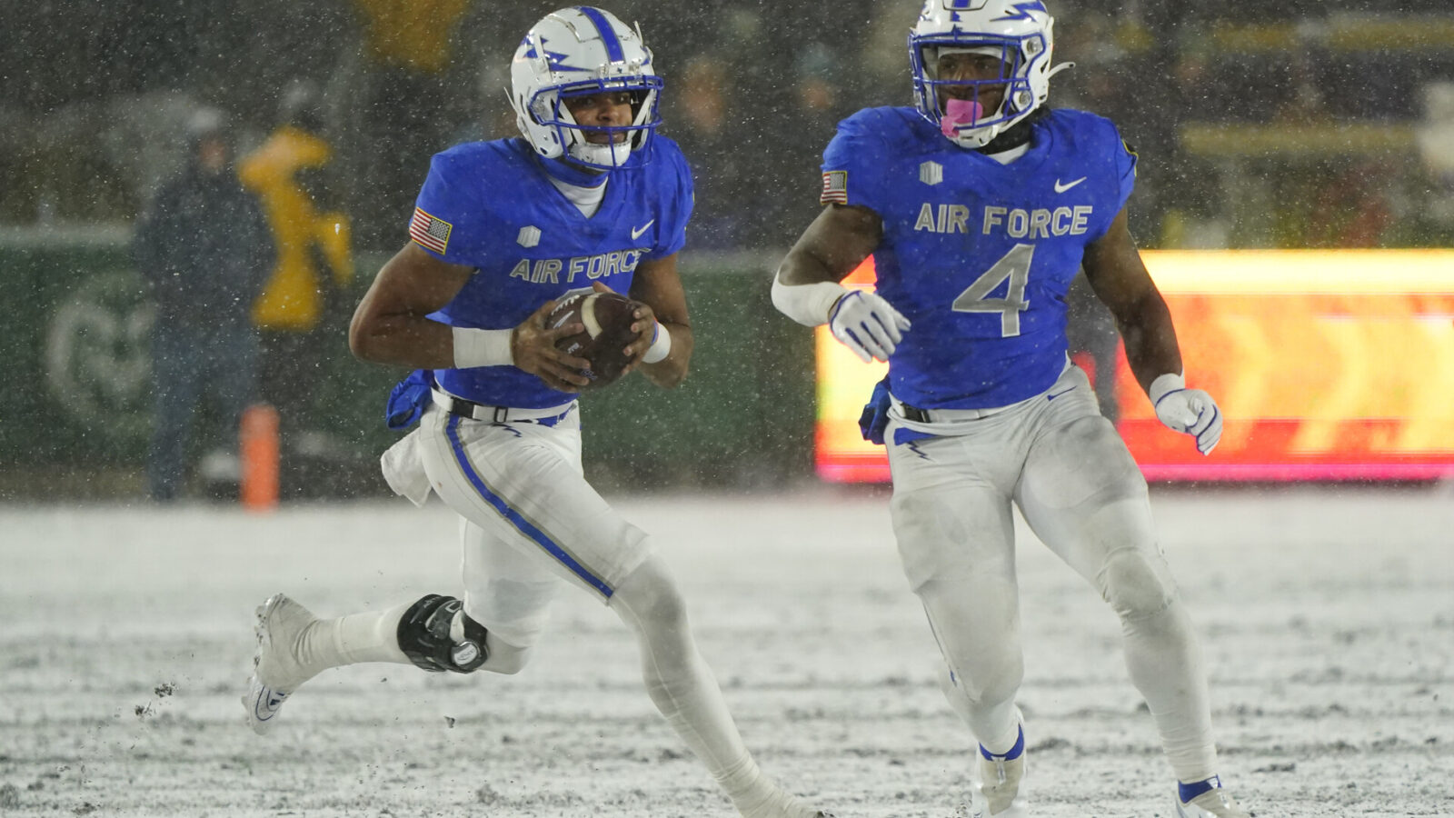 Oct 28, 2023; Fort Collins, Colorado, USA; Air Force Falcons quarterback Zac Larrier (9) runs with the ball against the Colorado State Rams at Sonny Lubick Field at Canvas Stadium.