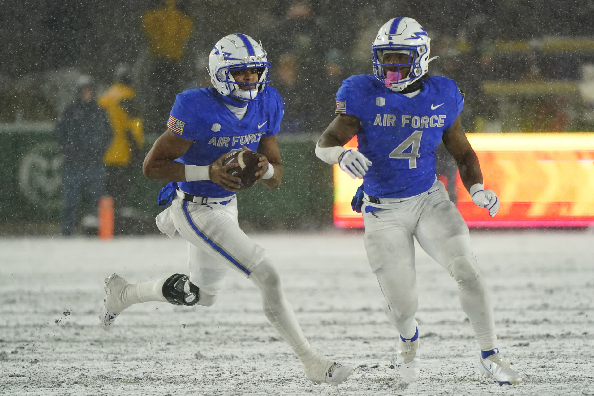 Oct 28, 2023; Fort Collins, Colorado, USA; Air Force Falcons quarterback Zac Larrier (9) runs with the ball against the Colorado State Rams at Sonny Lubick Field at Canvas Stadium.