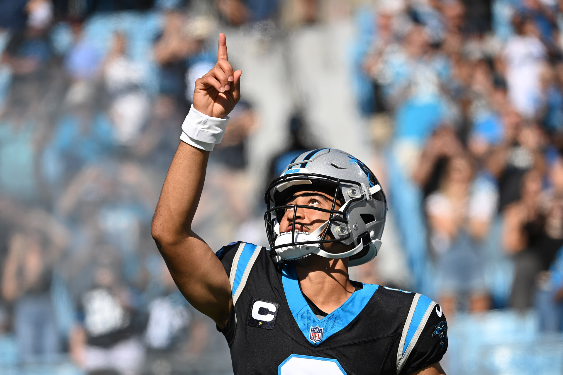 Oct 29, 2023; Charlotte, North Carolina, USA; Carolina Panthers quarterback Bryce Young (9) runs on to the field before the game at Bank of America Stadium.