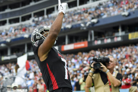 Oct 29, 2023; Nashville, Tennessee, USA; Atlanta Falcons running back Bijan Robinson (7) celebrates a touchdown against the Tennessee Titans during the second half at Nissan Stadium.
