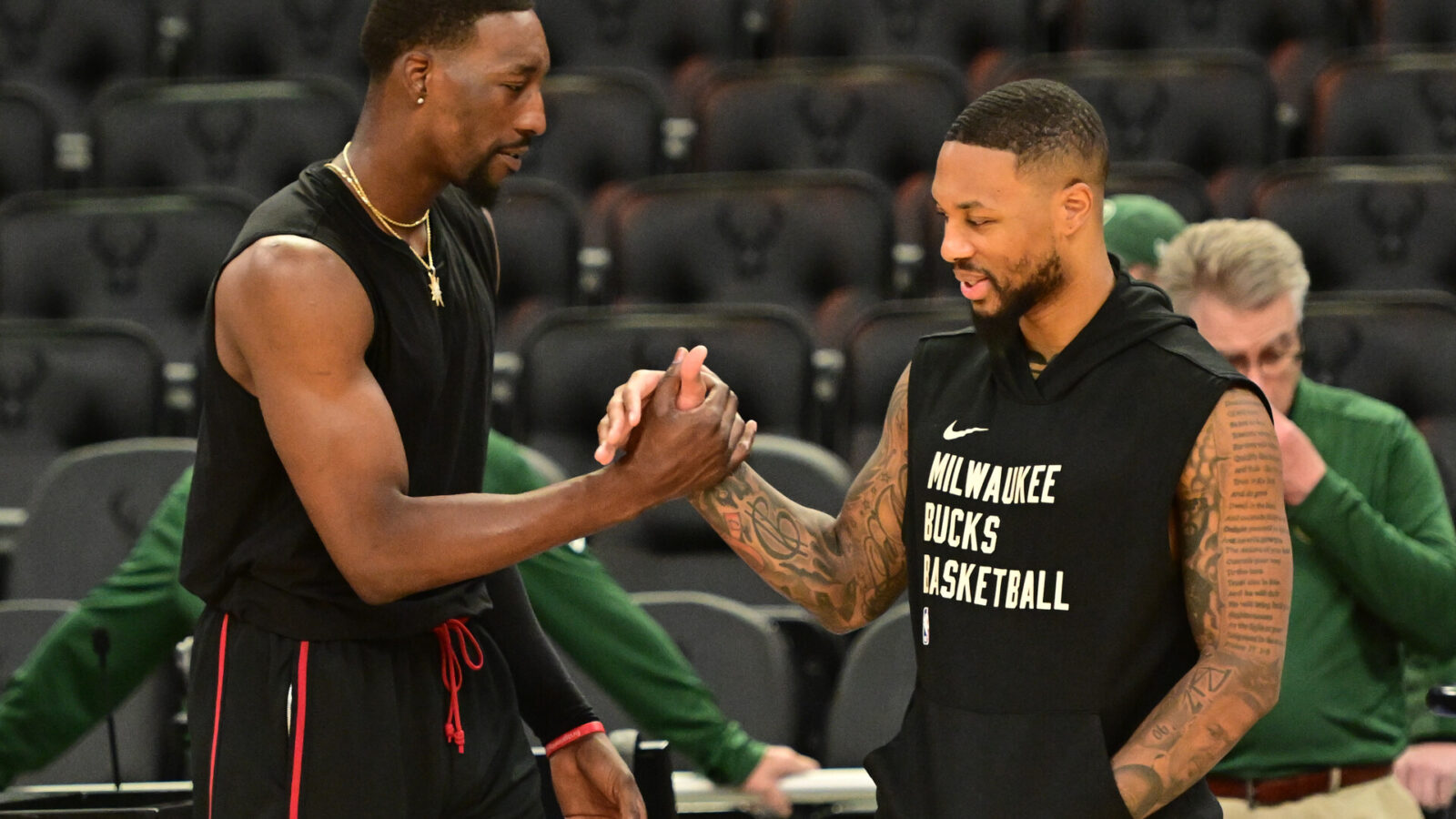 Oct 30, 2023; Milwaukee, Wisconsin, USA; Miami Heat center Bam Adebayo (13) greets Milwaukee Bucks guard Damian Lillard (0) before the game at Fiserv Forum.
